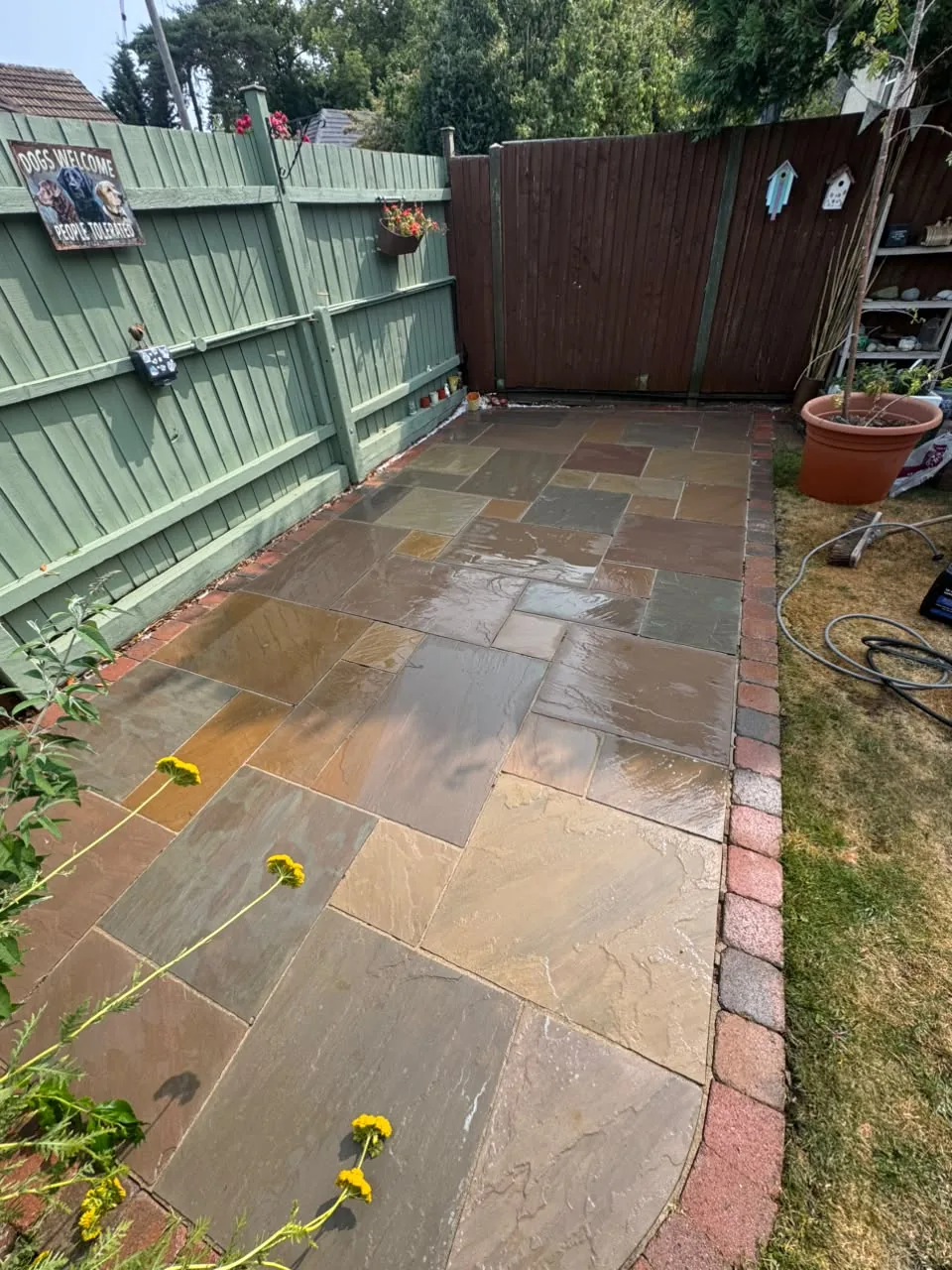 Patio slabs deep-cleaned free of algae and grime
